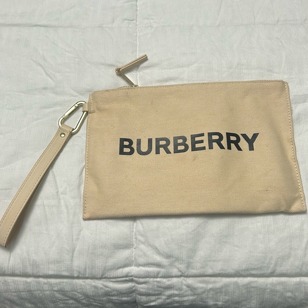 Burberry canvas clutch ecru black lettering approx 5x7